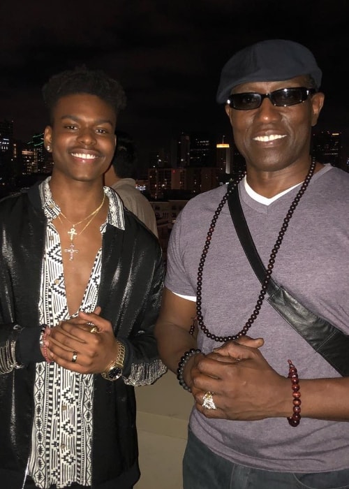 Aubrey Joseph (Left) as seen while posing with Wesley Snipes in July 2018