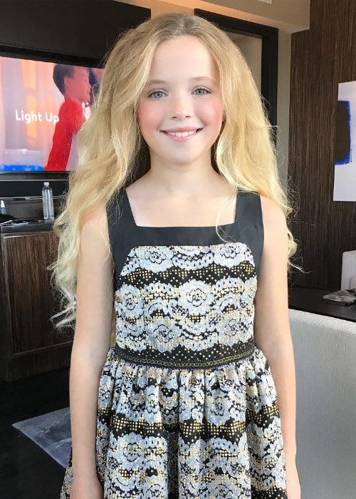 Cameron Seely as seen while smiling for a picture at Mandarin Oriental in New York, United States in November 2018
