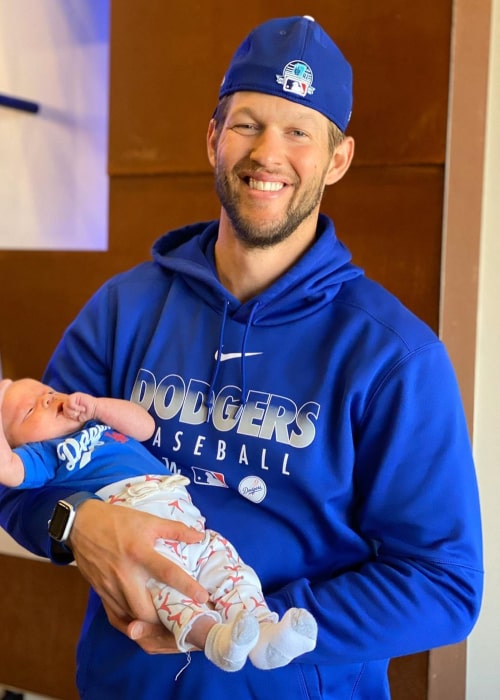Clayton Kershaw with his 3rd child, as seen in March 2020