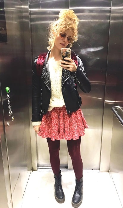 Esther Acebo as seen while taking a mirror selfie in an elevator in February 2019