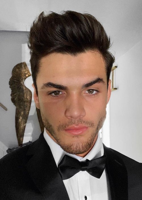 Grayson Dolan wearing a bow tie in a June 2019 selfie
