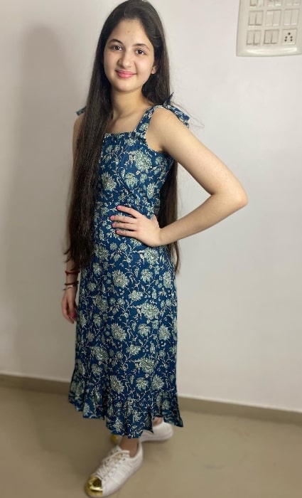 Harshaali Malhotra as seen while smiling for a picture in January 2022