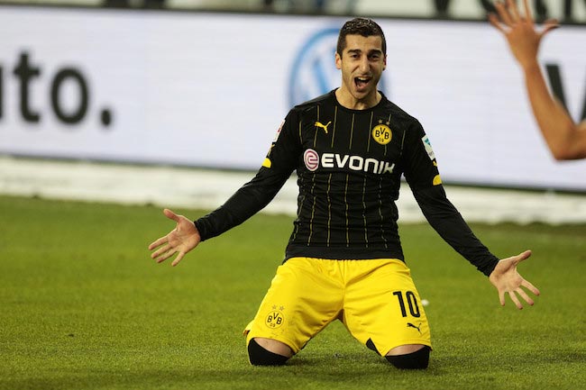 Henrikh Mkhitaryan celebrates a goal in a match between Borussia Dortmund and VfL Wolfsburg on December 5, 2015