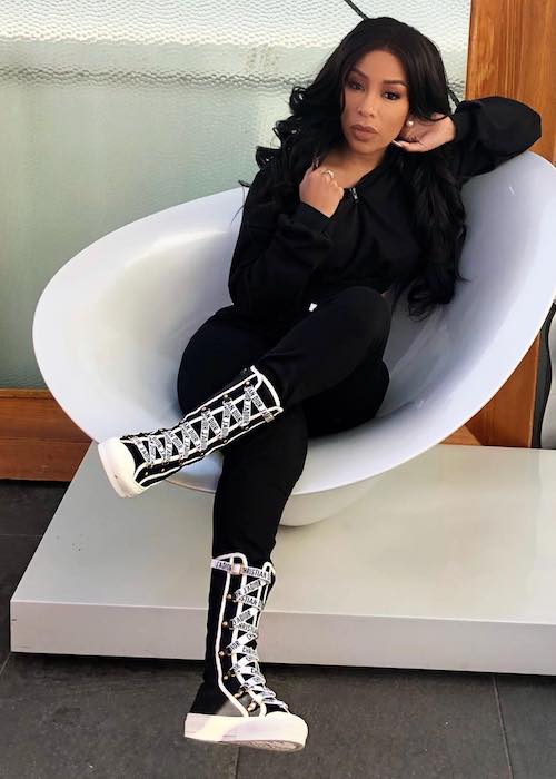 K. Michelle in black gear in July 2018