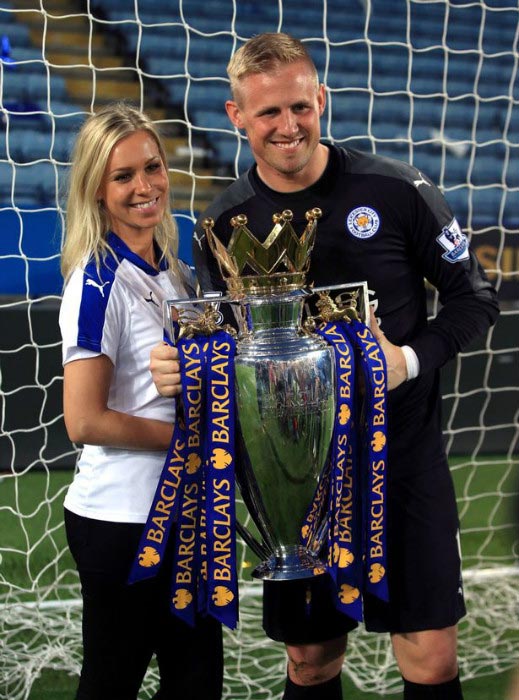 Kasper Schmeichel with his wife Stine Gyldenbrand with the Premier League trophy after home match against Everton on May 2, 2016